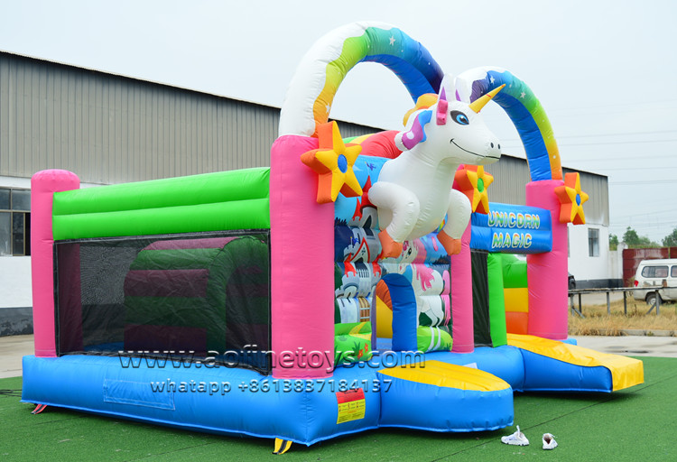 unicorn bouncer house with slide jumping castle